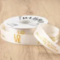 Gold stamped polyester ribbon for gift packaging, flower bouquet wrapping, and baking decor. - Off White