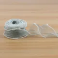Green pearl organza ribbon for gift wrapping, DIY crafts, and wedding bouquet decoration. - Sea Pine Green