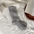 Calze lunghe in maglia di lana grigia, accoglienti calzini invernali spessi a coste per donna. - Taglia unica / Grigio chiaro