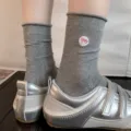 Cute grey mid-tube socks for women featuring pink bow embroidery, soft knit daily wear variant. - Gray