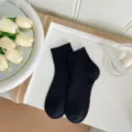 Versatile women's mid-tube socks, breathable knitted daily wear fashion socks for spring summer. - Black