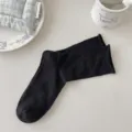 Calcetines negros de canalé para mujer, calcetines de algodón cómodos y transpirables. - Talla única / Negro
