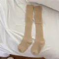 Knit wool over-the-calf socks for women, thick cozy winter knee-high stockings in camel. - One Size / Apricot Beige