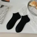 Black ruffled ankle socks with ribbed design, perfect for spring and summer casual daily wear. - One Size / Black