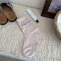Pink Fair Isle mid-tube socks for women with cute bows and hearts, Korean college style. - Pink