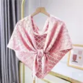 Pink knitted hollow shawl for women, lightweight summer triangular scarf, elegant outfit accessory. - Pink