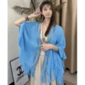 Blue knit hollow-out shawl cape ethnic style fringe tassel elegant women outer wear detail view - Hollow-Out Tassel Cape - Blue