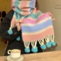 Detailed view of a colorful rainbow mohair winter scarf with cozy dopamine candy colors and tassels. - Striped Gradient Pompom - Green Pompom