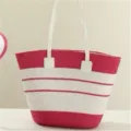 Detailed view of the pink and white striped straw woven texture and clean white double handles. - Single Bag / Rose Red