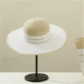 Detail view of the summer straw hat and matching bag, highlighting clear texture and design. - Hat Only / Beige