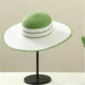 Green and white wide-brim straw hat detail view, stylish sun protection for summer outdoor travel. - Hat Only / Green