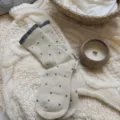 Cozy autumn winter knitted mid-calf socks with cute polka dots and ribbed cuffs for women. - One Size / Creamy White