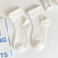 White mid-calf socks for women, cute Japanese JK style thin cotton solid color long hosiery. - Wide Cuff