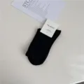 Comode calze da donna a metà tubo in cotone a fibra lunga anti-pilling in colore nero. - Taglia unica / Nero