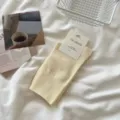 Warm color solid ribbed mid tube cotton socks for women, comfortable loose top daily wear. - One Size / Beige