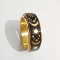 RVS spinner ring met zon maan en sterren motief, gouden kleur hemelse stijl retro sieraad. - Goud-Zwart (Roteerbaar)