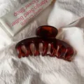 Large brown tortoiseshell hair claw clip, hollow keel design for daily elegant styling detail. - Round Head Dragon Bone / Large Style / Matte Tortoiseshell