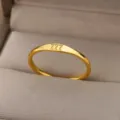 Minimalist gold titanium steel ring with angel number 777 engraved, stylish plain band accessory. - Angel Number 777 (JZ03-L8-15)