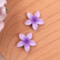 Purple resin plumeria flower cabochons for DIY crafts, earrings, and hair accessories. - Purple