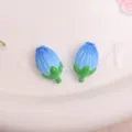 Blue tulip resin flower charm detail view, cute DIY accessory for phone case and crafts. - Blue