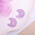 Purple glitter moon resin flatback charms detail view for DIY hair accessories and crafts projects. - Moon