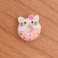 Close-up detail of a cute cat donut resin charm, perfect for DIY phone case decoration. - Cat Donut