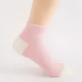Close-up detail of the pink and white mesh athletic ankle sock showing the breathable texture. - One Size / Pink