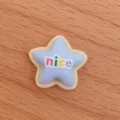 Detailed close-up of a cute blue star resin cabochon DIY charm for crafts and phone case deco. - Blue Stars