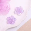 Close-up detail of purple glitter resin flower charms, perfect for DIY hair accessories. - Glitter Cherry Blossom