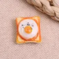 Detailed view of cute resin fried egg toast cabochon, perfect for DIY hair clips and phone cases. - Style 6
