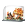 Forest cabin and treehouse building blocks set with LED lighting and clear dust cover display. - Autumn Forest Tree House Combination With Transparent Dustproof Display Cover / P3113