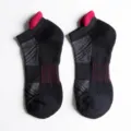 Detail close-up view of black athletic ankle socks with red tab and breathable mesh details. - EU 40-44 / 6821 Black