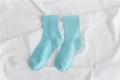 Detailed view of light blue cotton mid-calf socks, featuring ribbed design for casual wear. - Size 35-40 / Lake Blue
