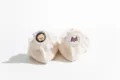 Close-up of cute cartoon dog embroidery on beige low-cut cotton socks heel detail. - One Size / Beige