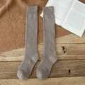 Warm winter thick long socks for women, cozy knitted high calf socks in solid brown color. - One Size / Dark Coffee