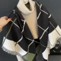 Detail view of black white and green colorblock tassel cashmere feel square shawl. - Square Black and Green