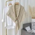 Beige knitted shawl with leather buckle, thick warm cape wrap, stylish winter outerwear. - Beige