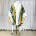 Colorful zigzag knit cape with plush faux fur collar and tassels for cozy winter style. - Green Yellow