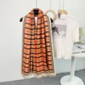 Classic orange and beige plaid scarf with fringe, soft winter warm long fashion accessory. - Black and Orange