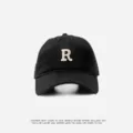 Black baseball cap with white R embroidery, stylish casual sun hat for men and women. - Adjustable (55-59cm) / R Badge / Black