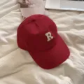 Red baseball cap for women featuring white embroidered letter R, stylish casual cotton hat. - 54-58cm (Adjustable) / Burgundy