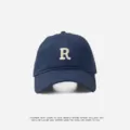 Navy blue baseball cap with white embroidered letter R, classic casual outdoor sun protection hat. - Adjustable (55-59cm) / R Badge / Navy Blue