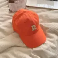 Orange baseball cap with embroidered letter R, stylish casual cotton duckbill hat for women. - Orange