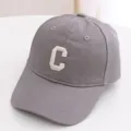 Grey kids baseball cap with white embroidered letter C, casual cotton cute duck tongue hat. - 48-52cm / Letter C Style / Gray
