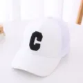 Kids white mesh baseball cap featuring a black embroidered letter C for casual daily wear. - 54cm / Mesh C Letter Style / White