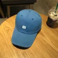 Blue casual baseball hat for women and men, minimalist letter M embroidered curved brim sun cap. - Adjustable / Blue