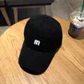 Black baseball cap for women and men, simple curved brim sun hat with white embroidered m letter. - Adjustable / Black