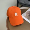 Gorra de béisbol naranja para mujer, logotipo R bordado, estilo vintage streetwear. - Naranja