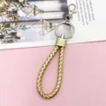 stylish gold braided leather keychain with metal keyring and clasp for car keys and bags. - Wrapped Leather Cord / Gold