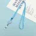 Light blue retractable badge reel lanyard, solid color polyester strap for ID cards. - 1.0 Retractable Lanyard / Light Blue